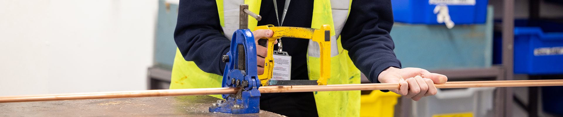 Construction, Building Services/Plumbing Harrow Weald student sawing some copper pipe